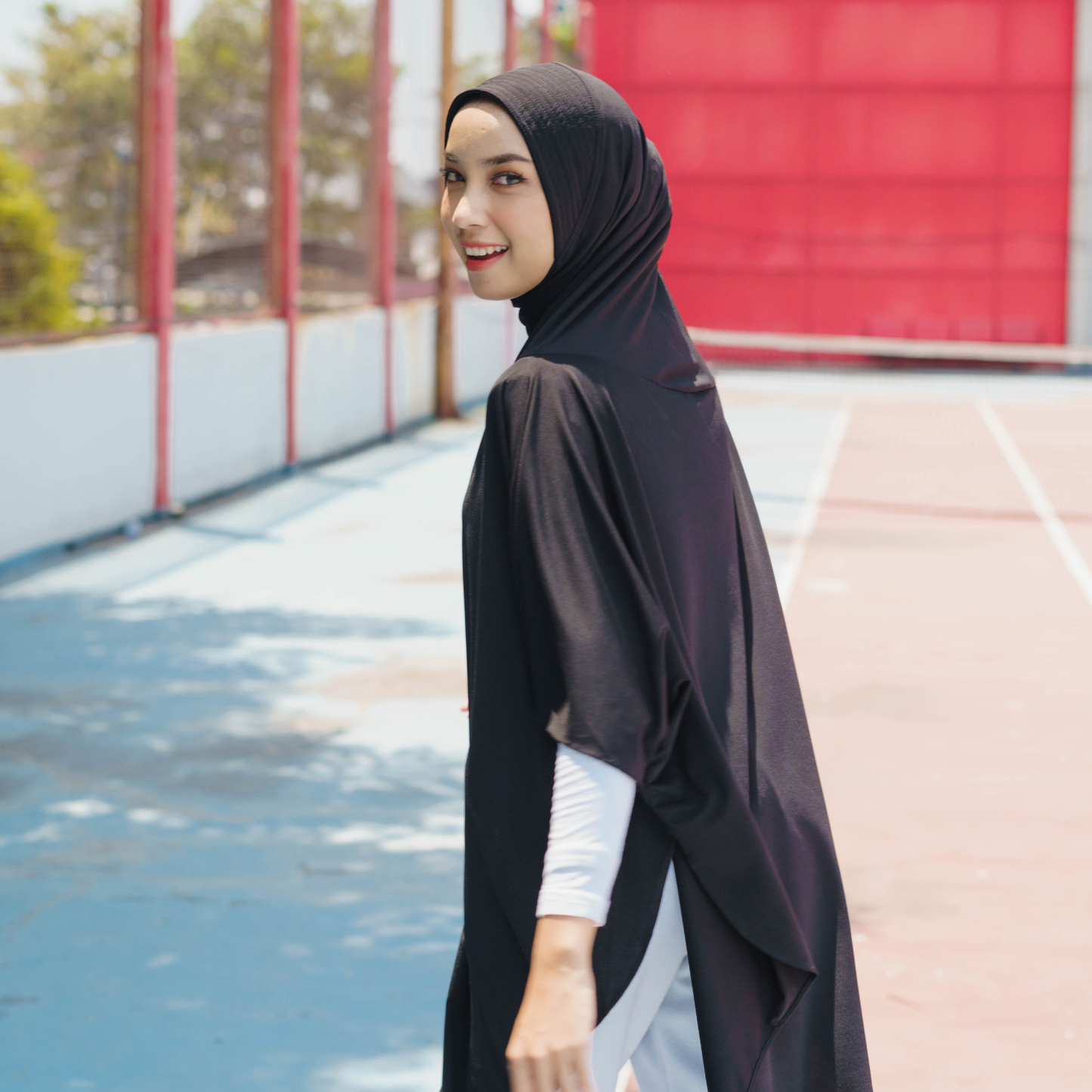 Qaila Hijab Sport Lengan Instan Jersey Hitam